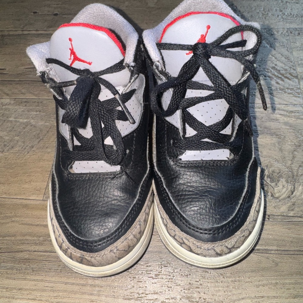 Jordan Kids Black and White Sneakers with Red Accents
